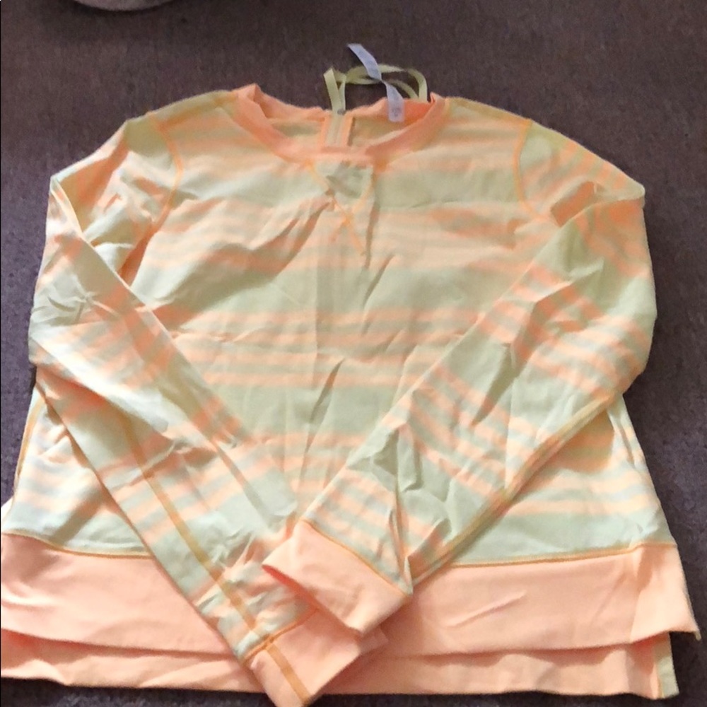 Lululemon size 6 yellow pullover with back zip